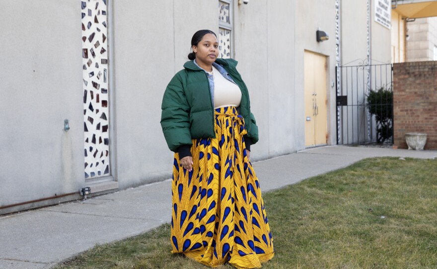 Deasia Sampson of Westland, Michigan, pictured outside Greater New Mt. Moriah Missionary Baptist Church on Sunday, voted for Biden in 2020 but isn't sure how she'll vote in November.
