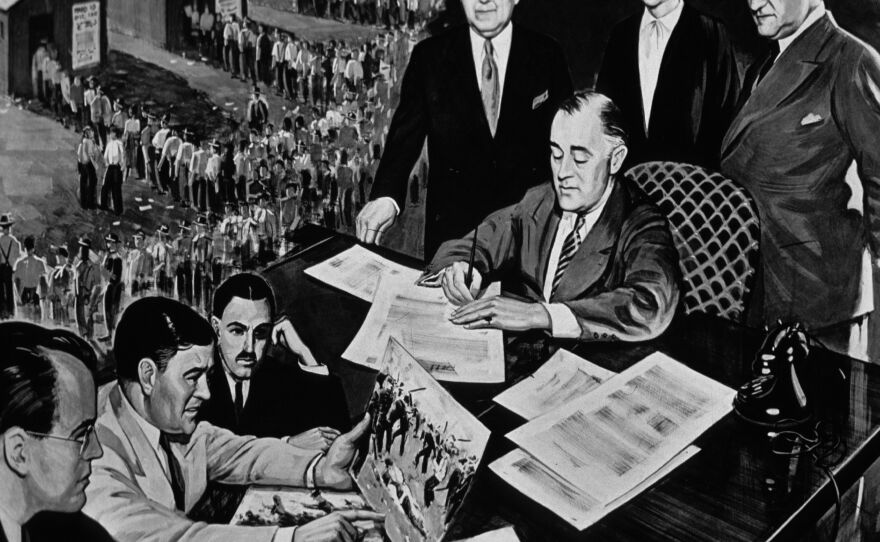 President Franklin D. Roosevelt signs the National Labor Relations Act in 1935.
