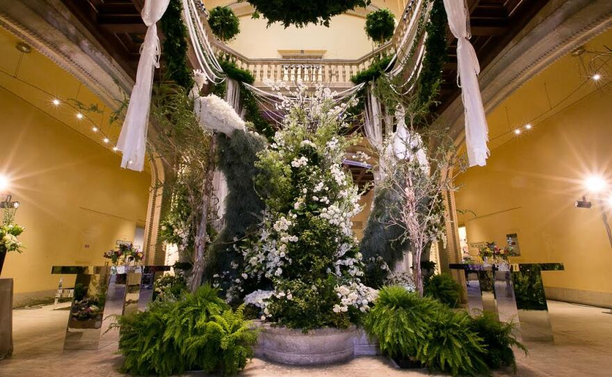 A photo of San Diego Museum of Art's Rotunda covered in flowers during Art Alive.