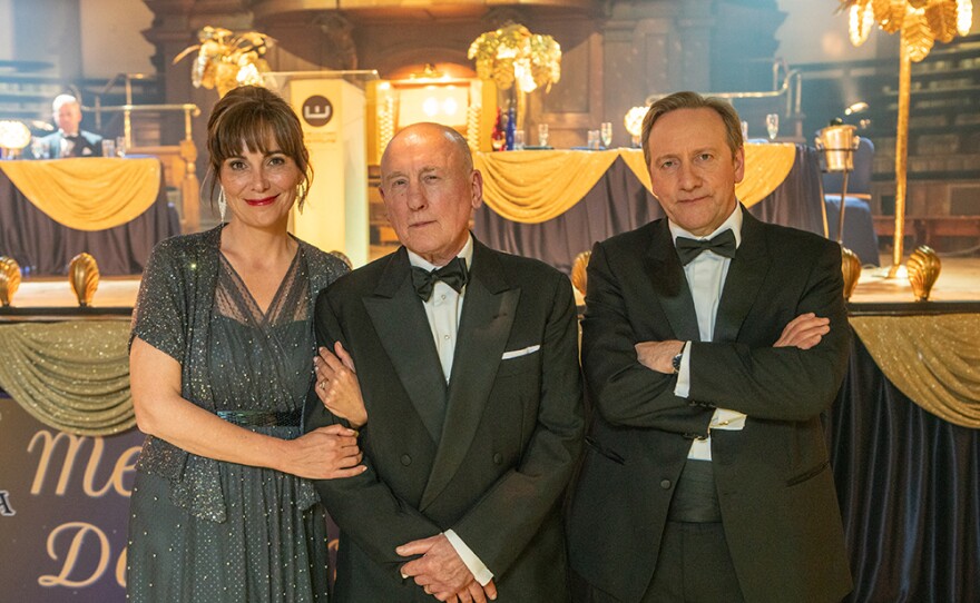 In MIDSOMER MURDERS 21 "The Point of Balance," Fiona Dolman as Sarah Barnaby, Christopher Timothy as Ted Barnaby, Neil Dudgeon as DCI John Barnaby.