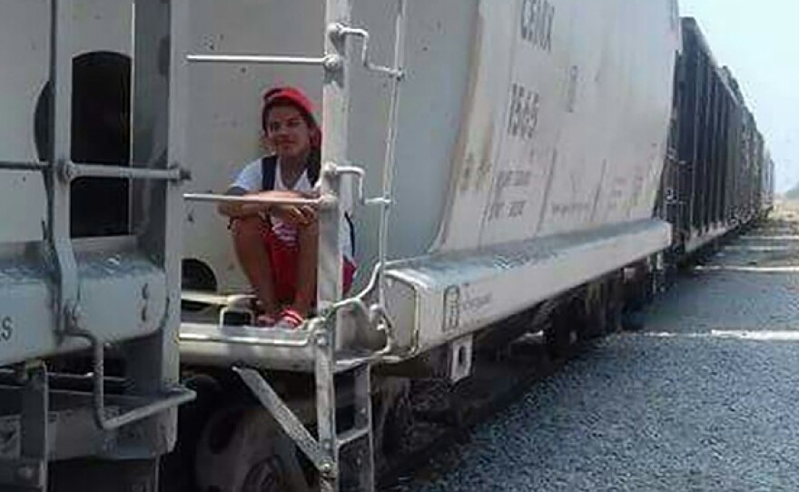 Luna Guzmán rides a train heading from Guatemala through Mexico in 2017. She traveled with several other LGBTQ migrants and said that at one point they were attacked by men armed with machetes.
