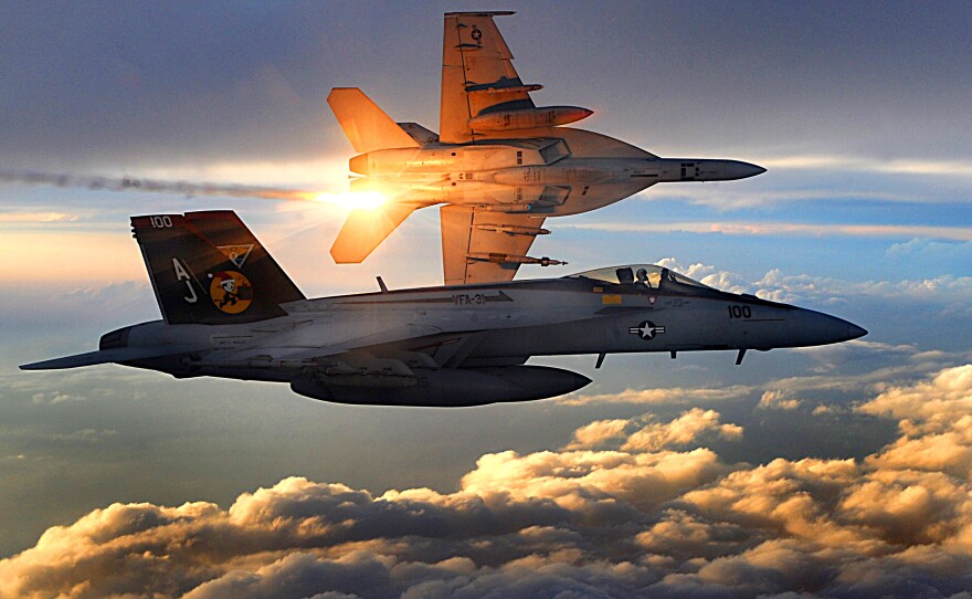 Two U.S. Navy F/A-18 Super Hornets of Strike Fighter Squadron 31 fly a combat patrol over Afghanistan, Dec. 15, 2008.