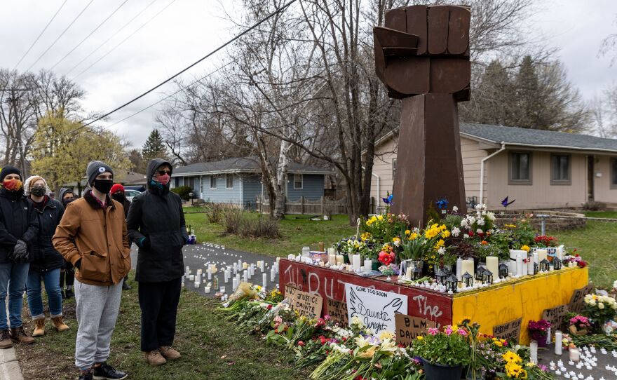 Mourners have built a makeshift memorial for Daunte Wright on the streets of Brooklyn Center, Minn., the quiet inner-ring suburb where police shot and killed Wright on Sunday.