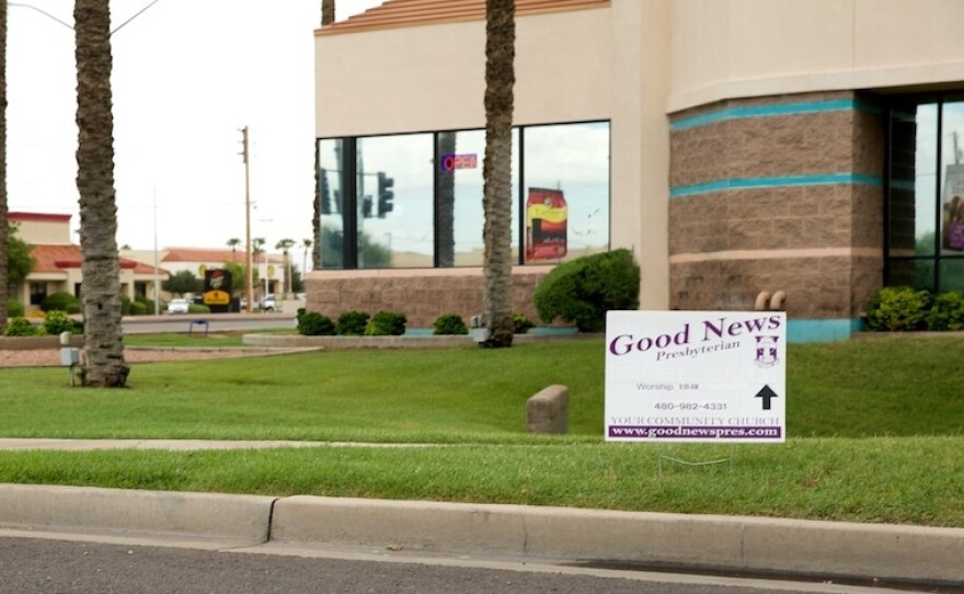 Good News Community Church, a tiny congregation of 25-30 adults, meets in different rented spaces in suburban Gilbert, Ariz. Signs pointing residents to services are limited to 6 square feet.