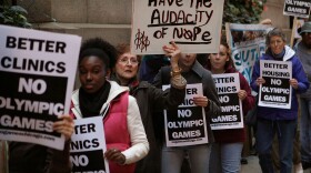 Demonstrators protest outside City Hall against Chicago's bid to host the 2016 Olympics September 29, 2009 in Chicago, Illinois. 