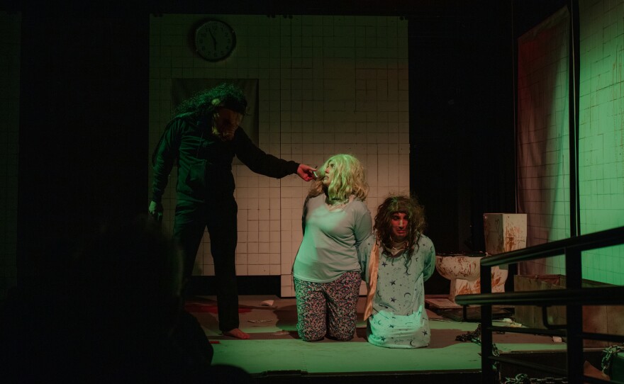 Jill Owen (left) and Adam Parbhoo (right) on stage.