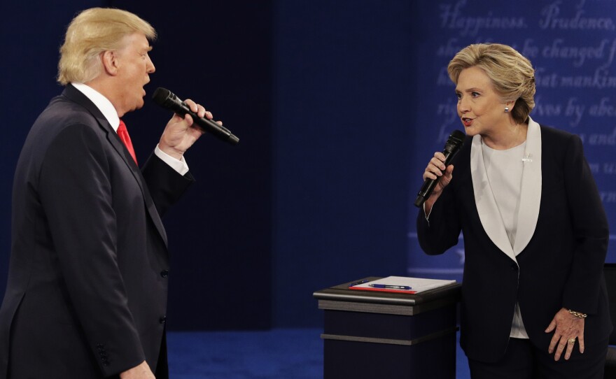 President-elect Donald Trump and Hillary Clinton debate in St. Louis on Oct. 9. The CIA has concluded that the Russians sought to tip the advantage in Trump's favor, a finding that Trump has dismissed.