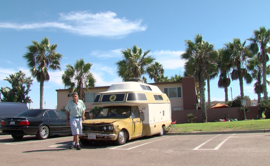 Michael Bloom pictured in front of the camper he has slept in the last 11 years at Dog Beach in Ocean Beach, Sept. 25, 2017.