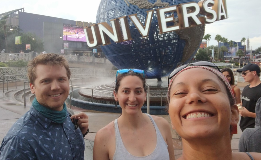 Ashley (center) with her friends Cliff (left) and Amanda (right) at Universal Studios. Ashley says Amanda helped her find a welcoming queer community in Colorado.