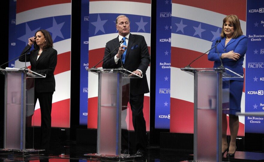 Candidate for California's U.S. Senate seat Duf Sundheim, center, answers a question as Democratic Congresswoman Loretta Sanchez, right and state Attorney General Kamala Harris listen during a U.S. Senate debate at The University of the Pacific in Stockton, April 25, 2016.