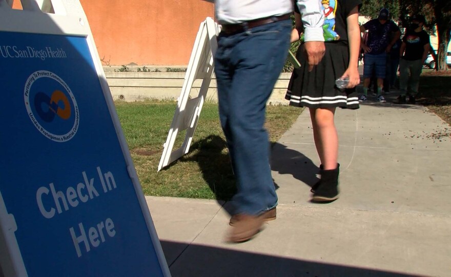 Parents and children line up for COVID vaccinations, San Diego Unified Education Center, November 12, 2021