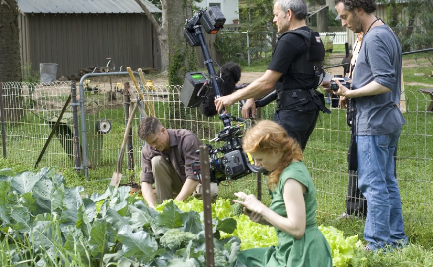 Filmmakers use hand-held cameras to capture the scenes of <em></em>Terrence Malick's <em>The Tree of Life</em>, starring Brad Pitt and Jessica Chastain.