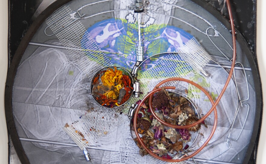 <em>Poison 3</em>, 2022. Mixed media, found material. 17 in. x 19 in.