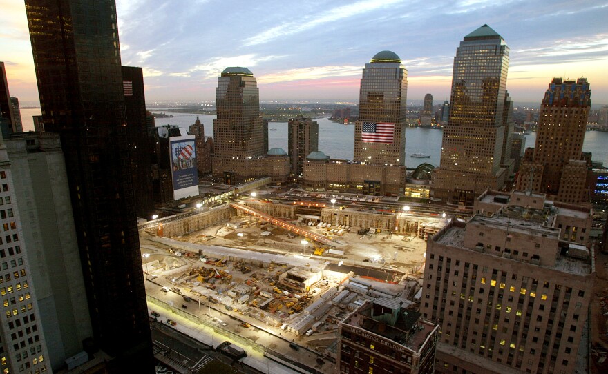 The sun sets on the ground zero site in 2002, the evening before the one year anniversary of the attacks on the World Trade Center in New York City.