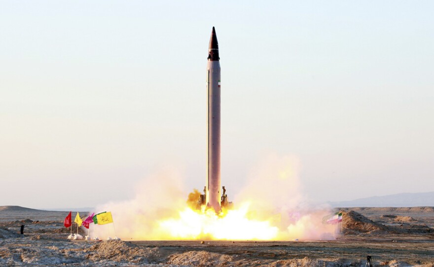 This picture released by the official website of the Iranian Defense Ministry on Sunday, claims to show the launching of an Emad long-range ballistic surface-to-surface missile in an undisclosed location.