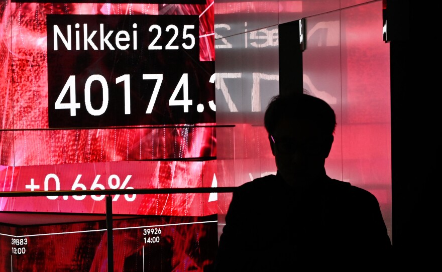 Stock markets from Tokyo to New York have rallied this year. Pictured is an electronic board displaying the level of the Nikkei index of the Tokyo Stock Exchange in Tokyo on March 4, 2024.