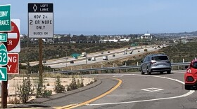 Vehicles drive onto State Route 52 west at Santo Road in San Diego on April 28, 2026.