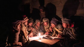 Shepherds attend a part-time night school near Mokhotlong, Lesotho. For many, these classes are the only form of education they can access.