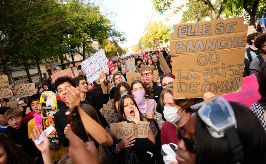 Students chant slogans during a demonstration against under-resourced schools, in Paris, Tuesday.