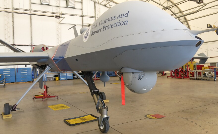 The equipment hanging from the Customs and Border Protection drone's underbelly includes a night camera, a day camera, a low-light camera and laser target illumination.