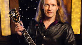 Billy McLaughlin with guitar in the KPBS studio. 