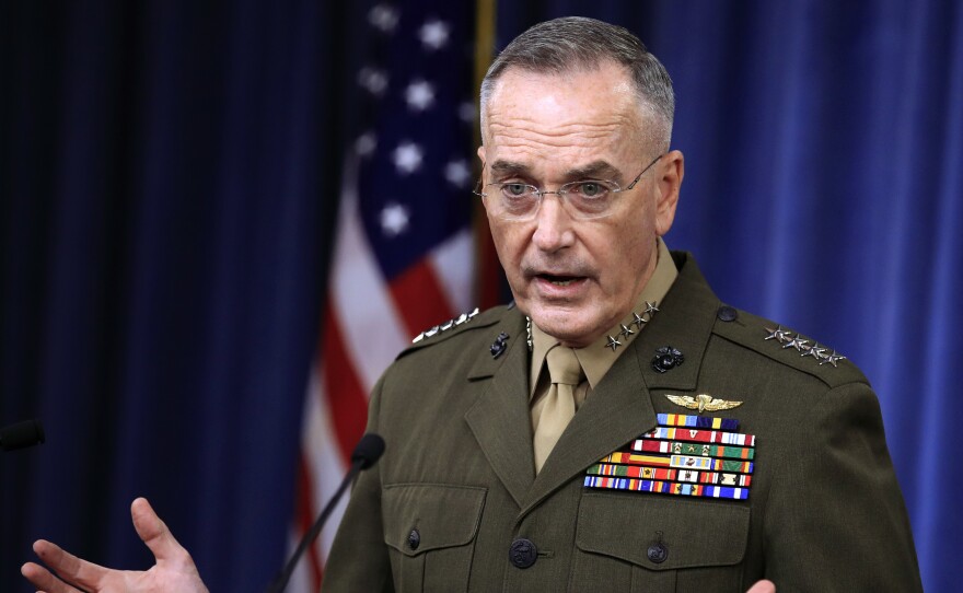Gen. Joseph Dunford, chairman of the Joint Chiefs of Staff, speaks to reporters about the Niger operation during a briefing at the Pentagon on Monday.