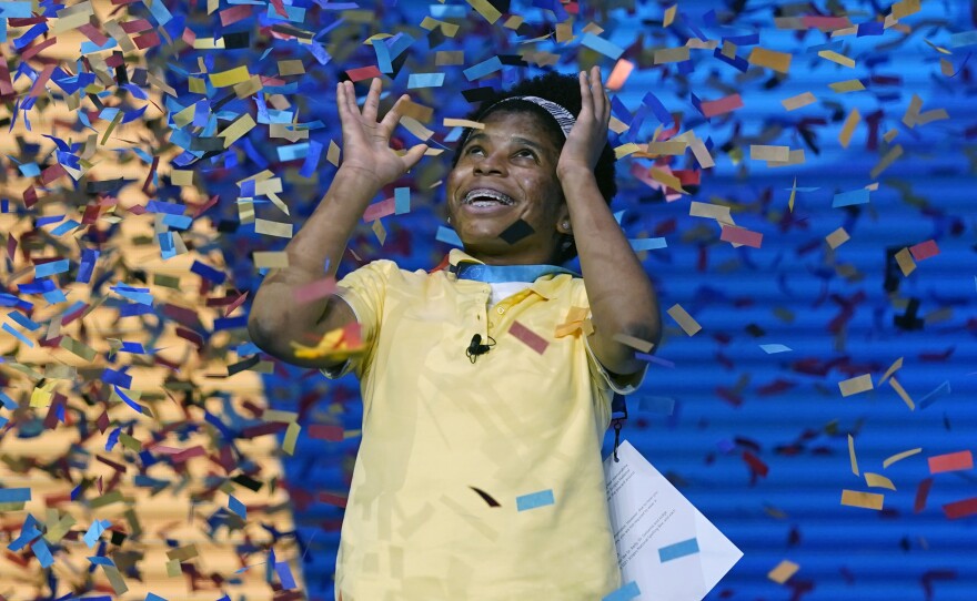 Zaila Avant-garde, 14, from Harvey, La., is covered with confetti as she celebrates winning the finals of the 2021 Scripps National Spelling Bee at Disney World Thursday, July 8 in Lake Buena Vista, Fla.
