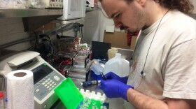 Will Shindel prepares for a gene-editing class using the CRISPR tool at a Brooklyn community lab called Genspace.