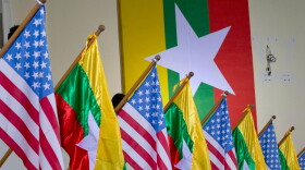 FILE - U.S. and Myanmar national flags are decorated at University of Yangon's convocation hall in Yangon, Myanmar, Nov. 19, 2012.