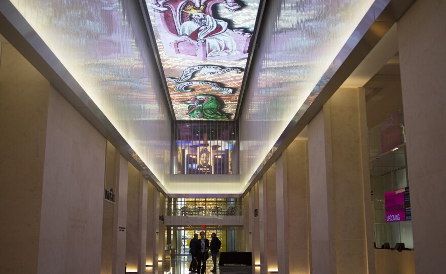 The lobby features a 140-foot digital mosaic that rotates through different images.
