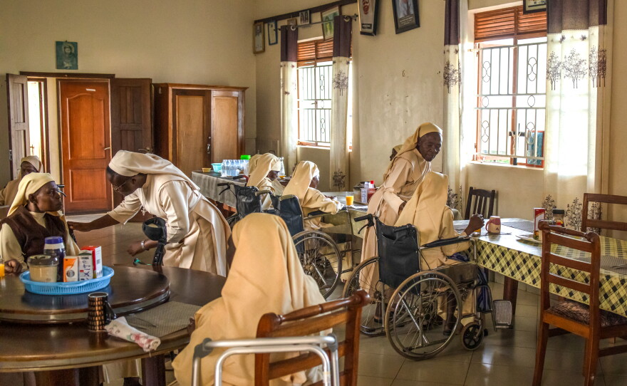 Elderly nuns sit in their dining room at the Little Sisters of St. Francis premises, where they'll have tea. Retired and aging members continue to live within the community compound.