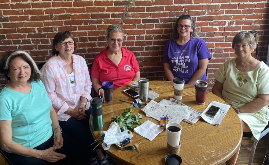 Old friends who meet at Ashtabula's Harbor Perk coffee shop but avoid talking politics because they are divided. From left, Donna Rullo, Valerie Rich, Christine Seuffert, Jolene Salo and Kaye Lind.