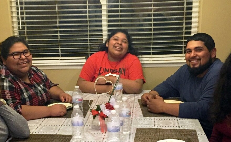 Amy Huerta (left), sister Katty and brother Luis Medellin of Lindsay, about an hour south of Fresno, talk about voting. Amy is the only member of her immediate family who can vote, but she doesn’t. Luis is trying to change that.