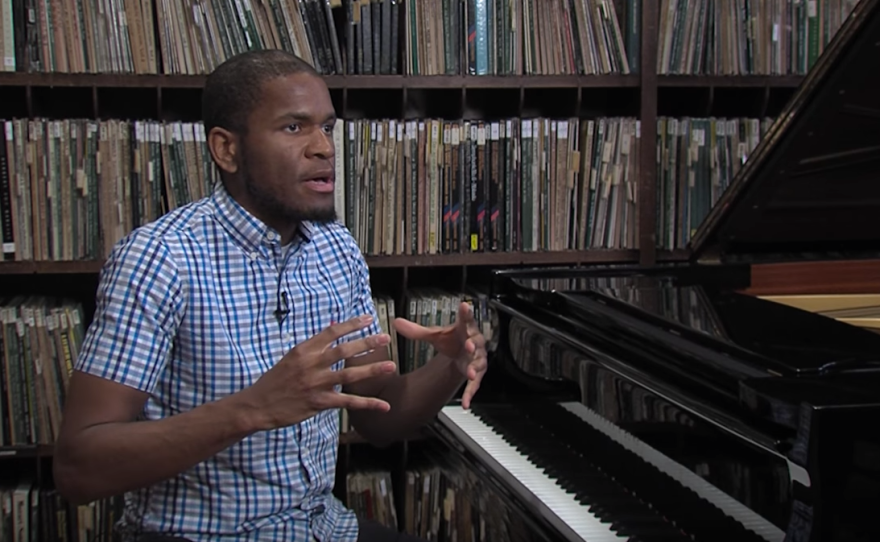 Joshua White, a jazz pianist, talks about performing at the Athenaeum Music and 
Arts Library, where he sits at the piano, Feb. 13, 2017. 