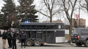 Police work outside the Molson Coors Brewing Co. campus in Milwaukee on Wednesday, Feb. 26, 2020, after reports of a shooting.