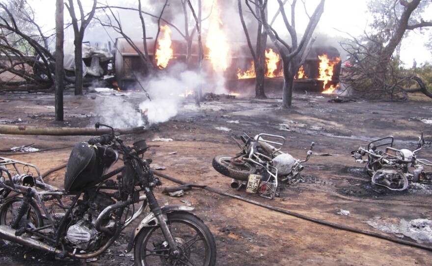 A damaged tanker truck exploded in Tanzania on Saturday as people were trying to siphon fuel out of it, killing at least 62.