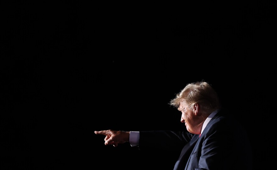 Former President Donald Trump addresses supporters during an August rally in Cullman, Ala.