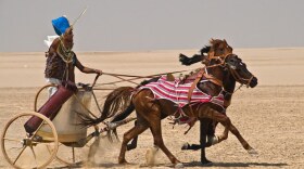 Re-creation of a charging chariot. Follow a team of experts who build and test accurate replicas of Egyptian royal chariots.