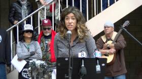 Steph Johnson speaks at a rally where she and other advocates for the homeless submitted a petition to San Diego Mayor Kevin Faulconer, calling for an end to ticketing and humanitarian action to house the street population, Jan. 3, 2017.