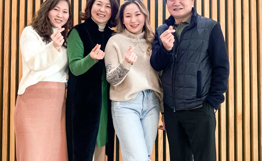 Monica Lee, third from left, with her sister, mother and father.