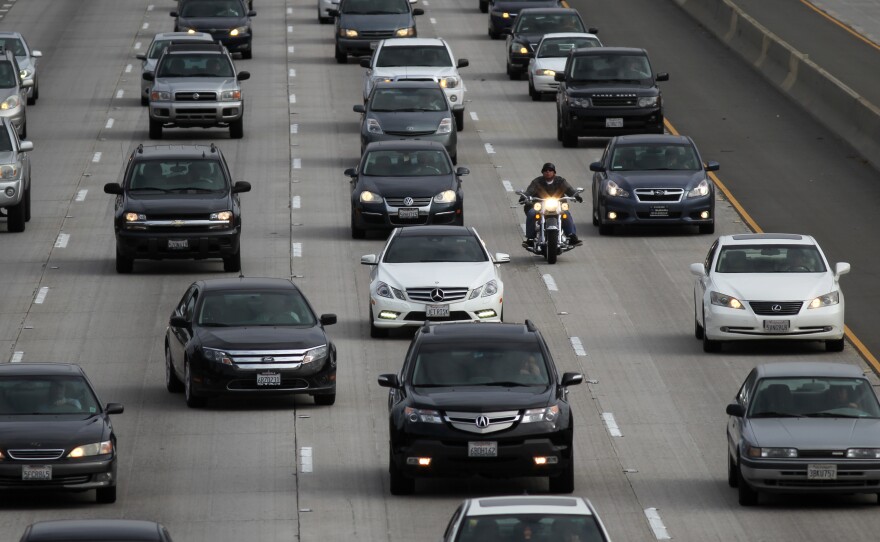 Morning traffic fills a freeway in Los Angeles. Seventeen automakers signed a letter to the Trump administration and California Gov. Gavin Newsom saying they want one set of policies to reduce greenhouse gases and make cars more fuel efficient.