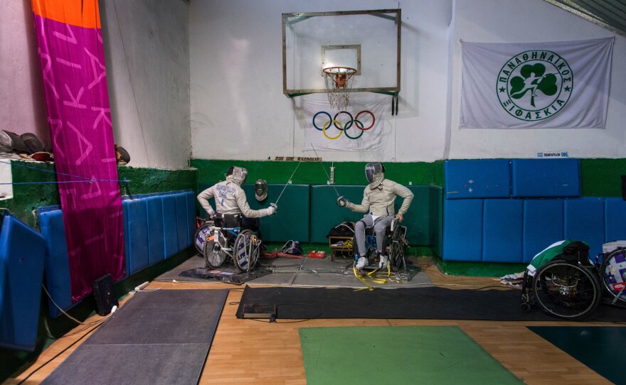 Triantafyllou (left) and Ntounis practice inside the small indoor court in Athens' Apostolos Nikolaidis Stadium, where Greece's national team consisting exclusively of people with disabilities is training.