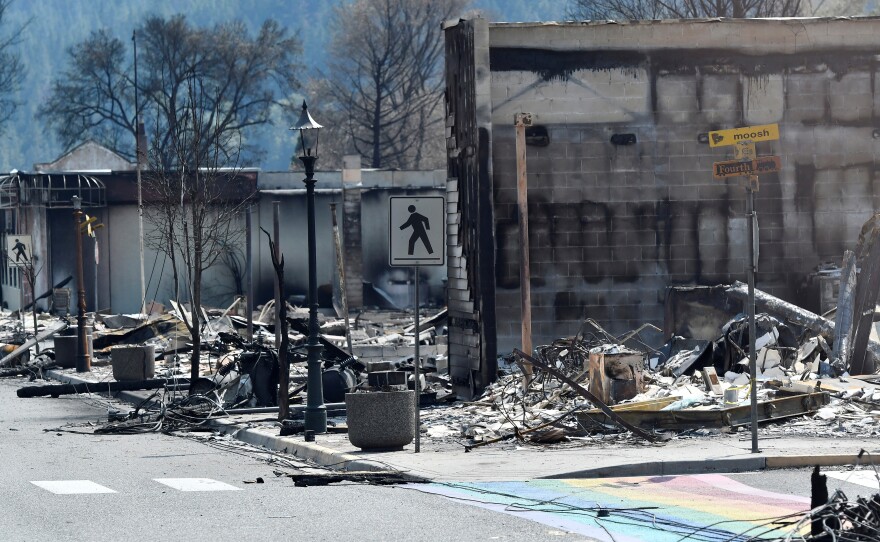 The charred remnants of homes and buildings, destroyed by a wildfire on June 30, are seen during a media tour by authorities in Lytton, British Columbia, on July 9.