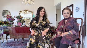 Susie Ghahremani (at left) and her mother, Zohreh Ghahremani, are shown in front of Zohreh's Nowruz spread and haft-seen on March 17, 2026. The two recently collaborated on the children's book "Celebrate Nowruz."