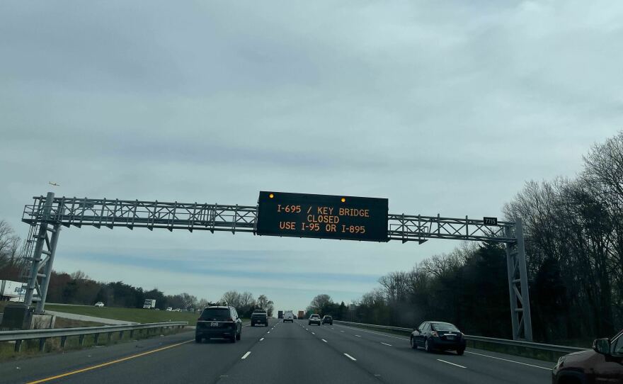 A sign warns drivers heading to Baltimore that the Francis Scott Key bridge is closed and to use alternate routes.