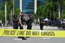Police officers are pictured outside the Wilkie D. Ferguson Jr. United States Courthouse before the arraignment of former President Donald Trump in Miami on Tuesday.