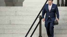 Former White House press secretary Sean Spicer walks down the steps of the Eisenhower Executive Office Building towards the White House, Friday, July 21, 2017. 