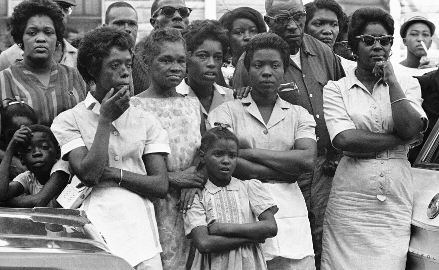Mourners outside funeral services for Carol Robertson, one of four girls killed in the 1963 bombing.