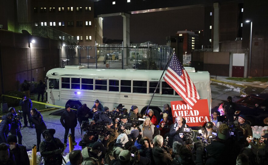 Supporters take part in a vigil outside a Washington, D.C., detention facility to protest the treatment of prisoners charged in connection with the Jan. 6 attack on the U.S. Capitol.