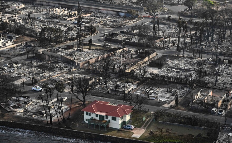 The fire that devastated historic Lahaina in western Maui left a red-roofed house relatively unscathed. Its owner says he wants to open the house to the neighborhood to help the rebuilding process.